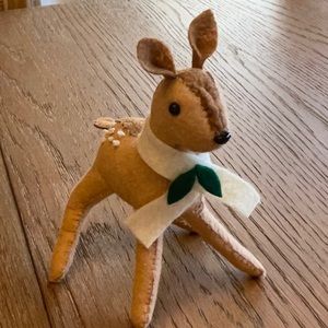 Handmade felt doe reindeer.